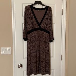 Athleta wrap dress in taupe and black.  Size large.  Slight kimono sleeves.